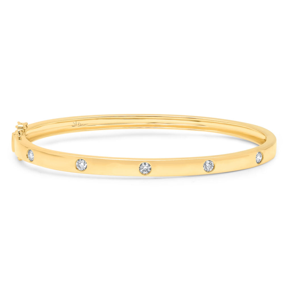 Gold and diamond bangle